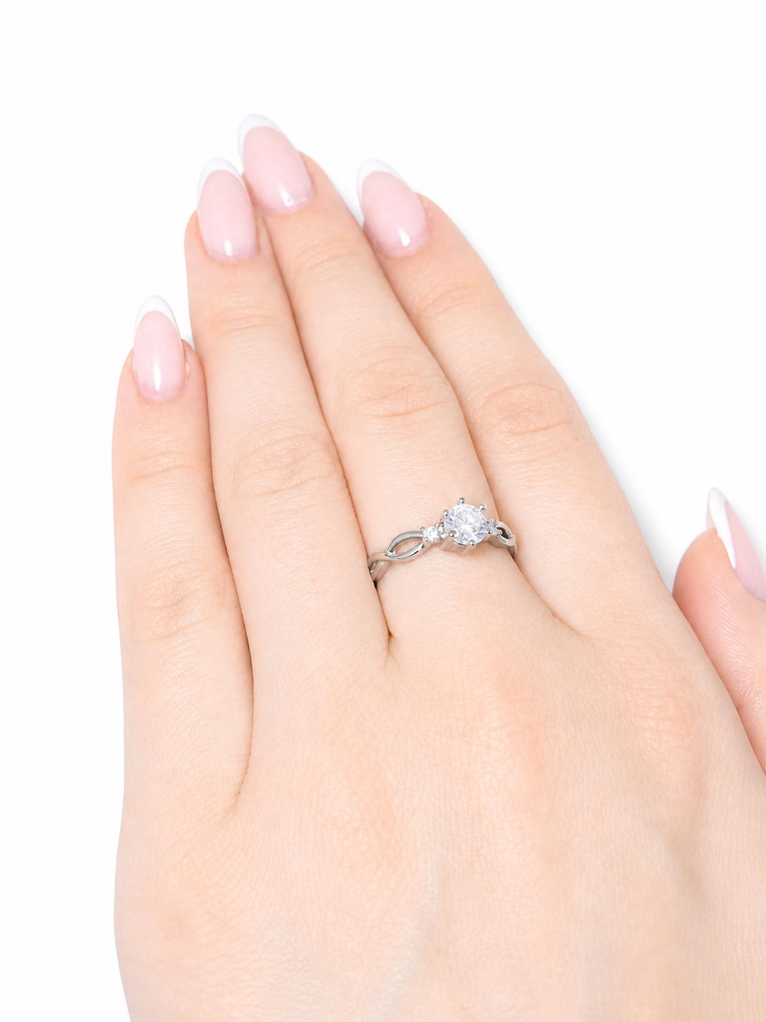 Aura Ring – Zirkonia-Trio mit geschwungener Unendlichkeitsschiene, Edelstahl mit Platinbeschichtung