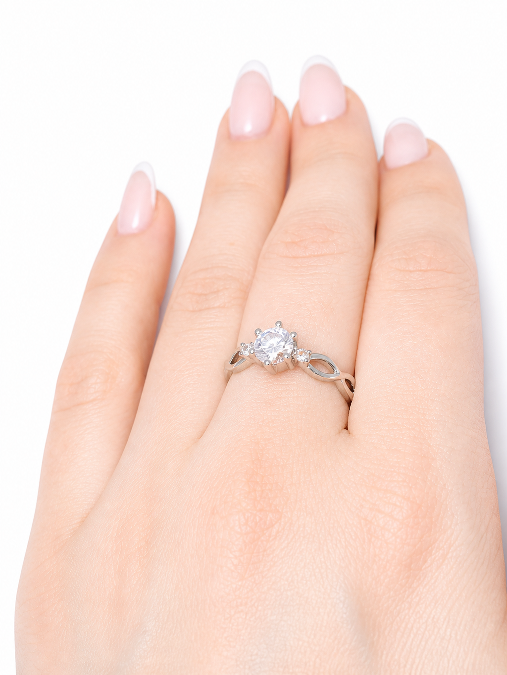Aura Ring – Zirkonia-Trio mit geschwungener Unendlichkeitsschiene, Edelstahl mit Platinbeschichtung