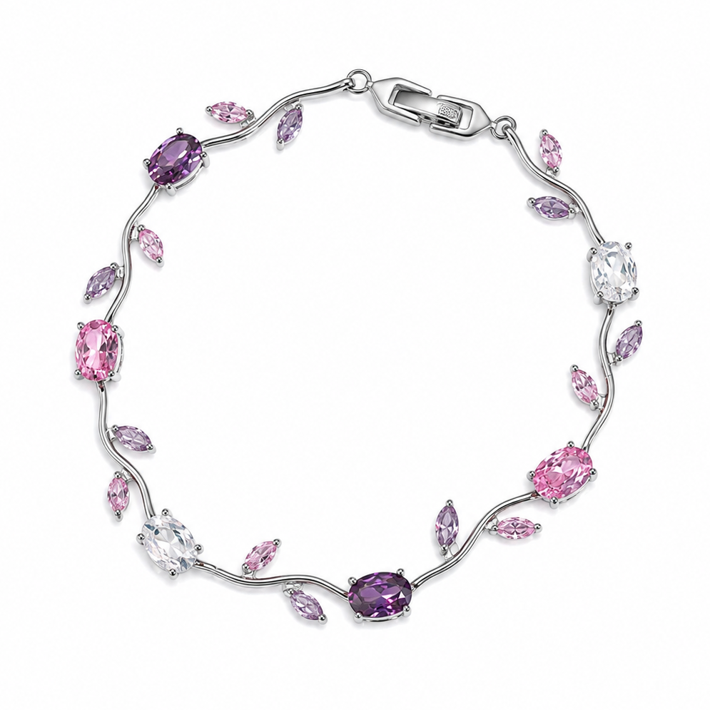 Tulipa Bloom Armband in silberfarbener Ausführung mit bunten Zirkonia-Steinen in Rosa, Violett und Weiß, Draufsicht auf weißem Hintergrund