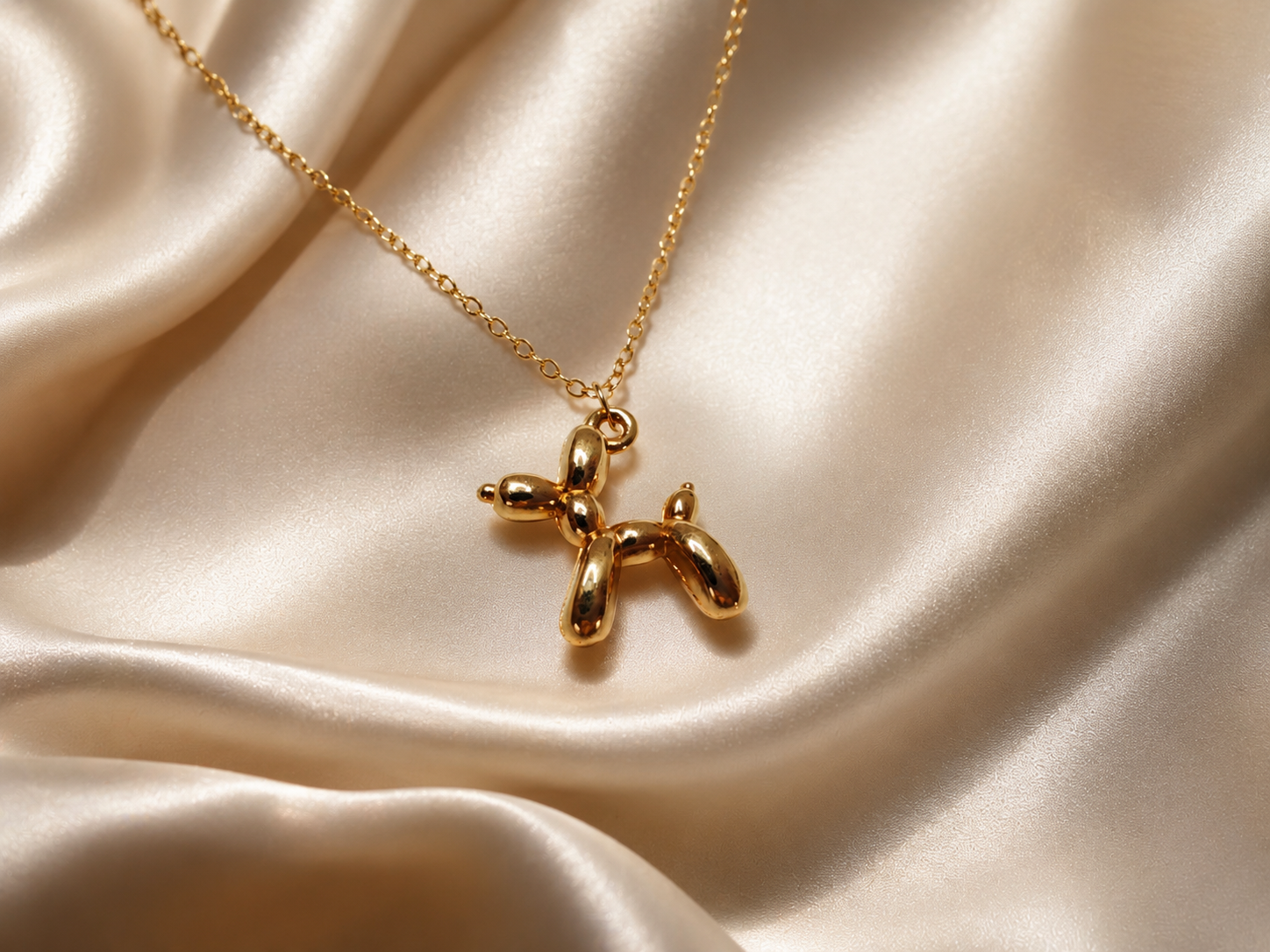 Balloon Dog Collier – Halskette mit Ballon-Hund-Anhänger in Gold und Silber