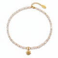Sonnenzauber Collier – handgefertigtes Kristall-Collier in Rosa und Champagner mit goldenem Sonnen-Anhänger aus Sterlingsilber, Alextra Boutique Studio