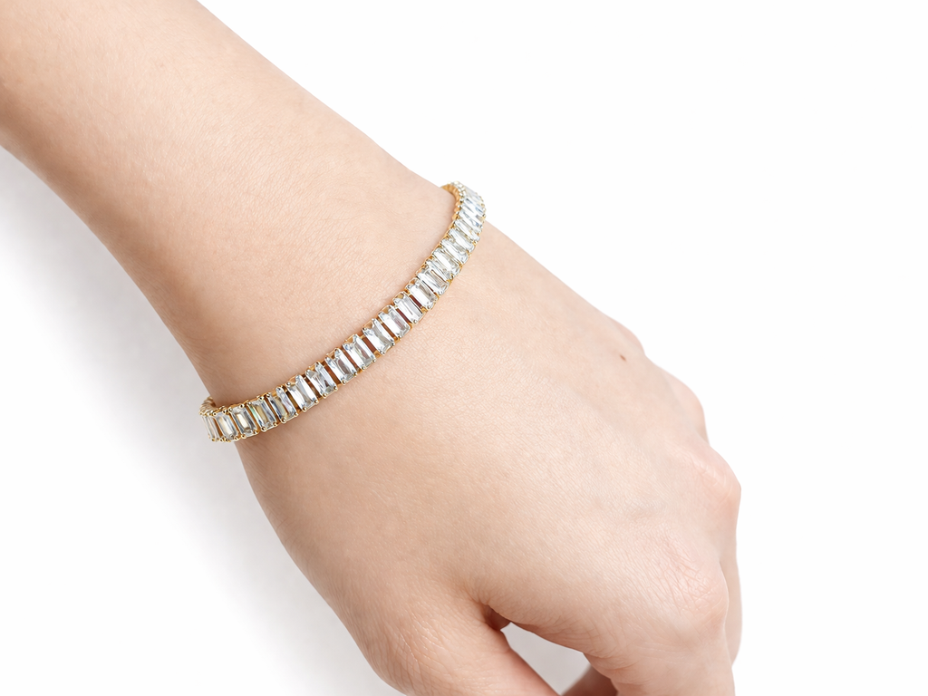 Lumière Armband – Goldenes Tennisarmband mit Baguette-Zirkonia