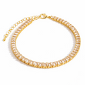 Lumière Armband – Goldenes Tennisarmband mit Baguette-Zirkonia
