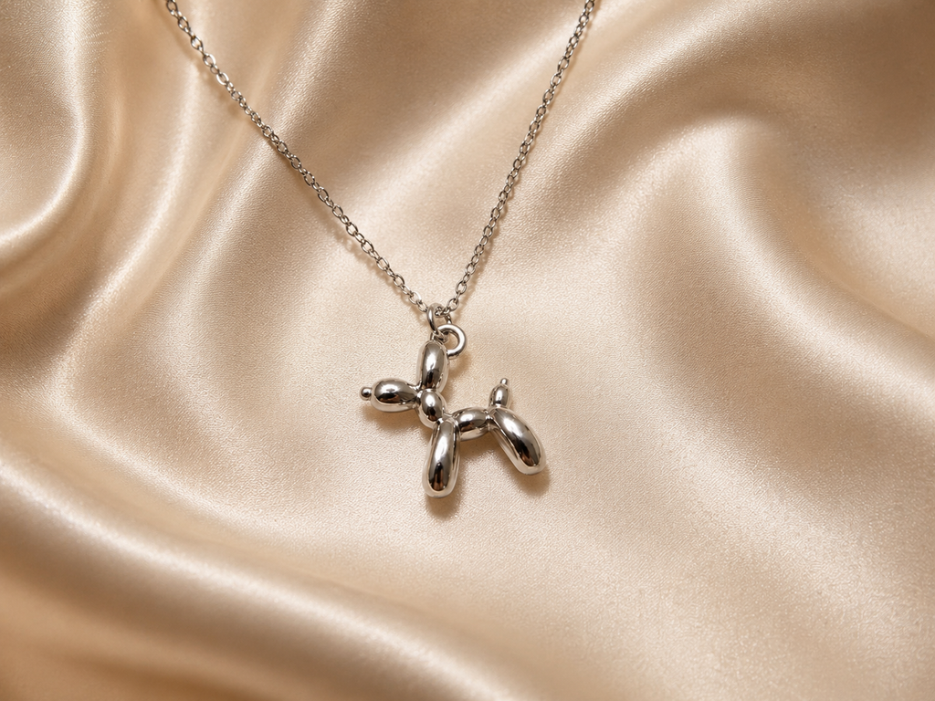 Balloon Dog Collier – Halskette mit Ballon-Hund-Anhänger in Gold und Silber
