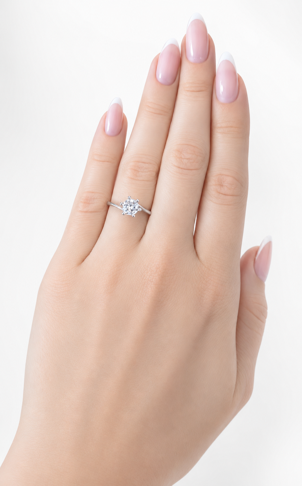 Vesta Ring – Zirkonia mit Sechskrallen auf asymmetrisch verlaufender, glatter Ringschiene, Edelstahl mit Platinbeschichtung